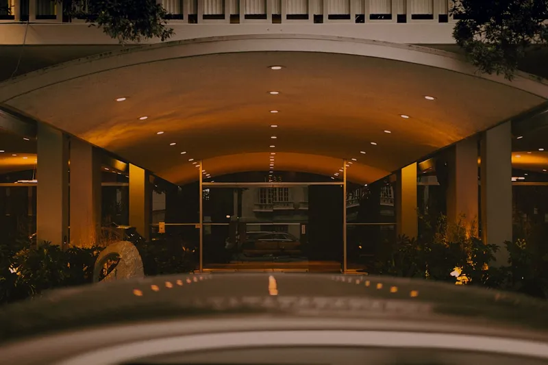 A car is parked in front of a building