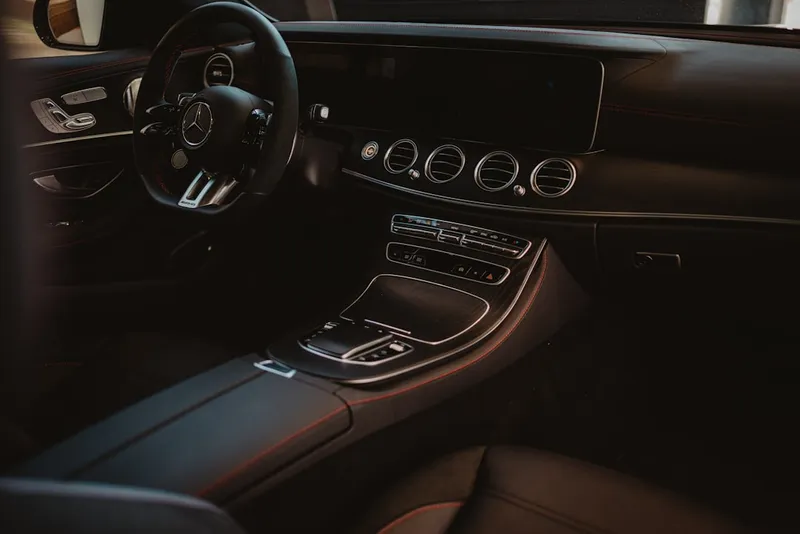 Modern car interior with dashboard and steering wheel